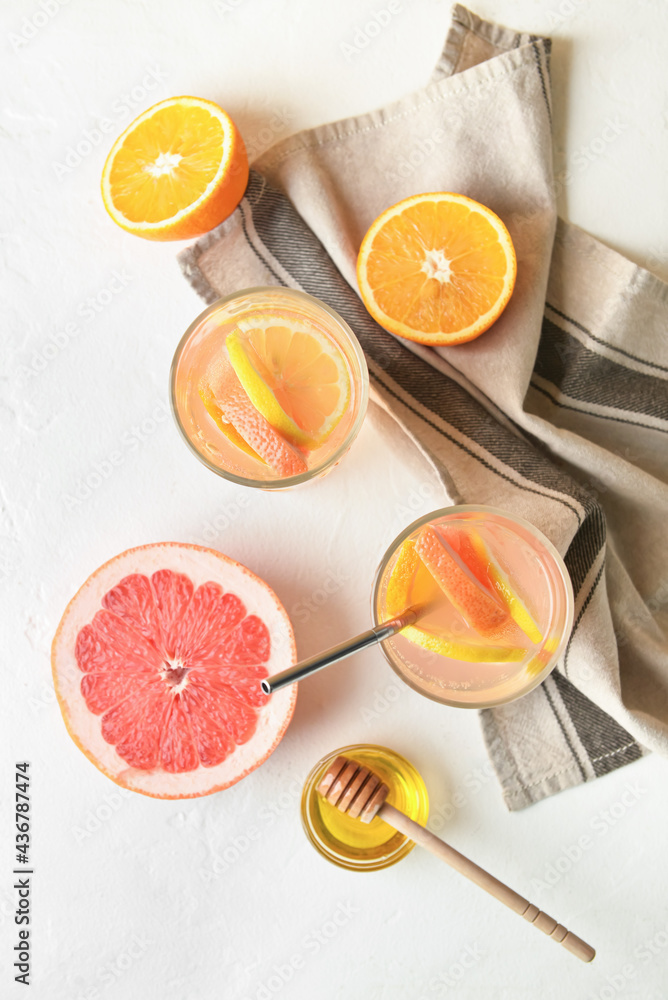 Composition with tasty lemonade on light background