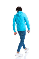 Sticker - back view of casual model in hoodie looking to side and walking