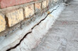 © sasha1806 - Crack in the foundation of the house.
