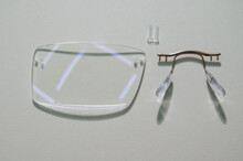 Disassembled Glasses And Instruments By An Ophthalmologist.