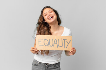 Wall Mural - young pretty woman holding a equality banner