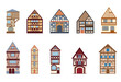 Set of cozy half-timbered houses isolated on a white background Collection of old German and French houses Illustration in a flat cartoon style