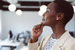 © Wavebreak Media - African american businesswoman thinking, touching chin at work
