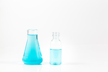 blue science test tube on white background,Laboratory glassware with colorful liquids on white background