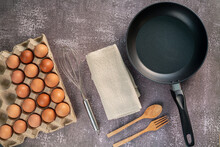 Still Life With Eggs And Pan On Wooden Table, Top View,Animal,Bread,Breakfast,Cholesterol,Circle,Close-up,Cooked,Cooking,Cooking Oil,Cooking Pan,Cutting Board,Drink,Egg,Egg Yolk,Farm,Food,Freshness