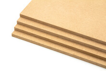 Raw MDF boards of brown color arranged in the shape of steps.