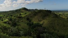 Vacation In Dominican Republic, View Of A Massive Grass Covered Mountain