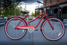 Calgary Alberta Canada, May 30 2021: A Ladies Huffy Cruiser Bicycle Parked On A Pathway At East Village Downtown During A Summer Evening.