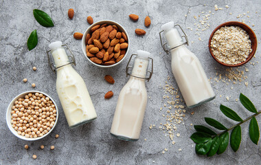 Bottles with different vegetable milk