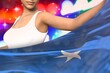 young lady holds Somalia flag in front on the party lights - flag concept 3d illustration
