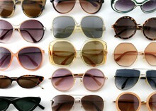 Variety Of Sunglasses On White Background
