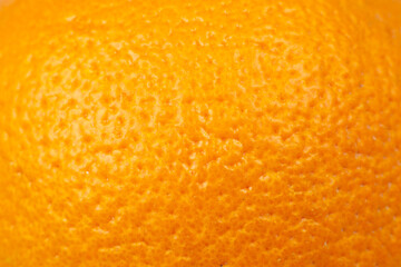 Close up photo of orange peel texture. Oranges ripe fruit background, macro view..Human skin problem concept, acne and cellulite. Beautiful natural wallpaper.