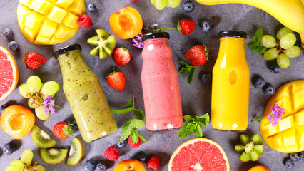 Wall Mural - fruit smoothie in bottle and fresh fruits