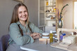 © Светлана Густова - A woman soap maker lays out and packs freshly prepared handmade soap and body care cosmetics. The process of assembling orders. Home spa. Small business.