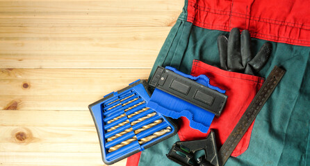 carpenter with tools concept, top view, above over wooden background