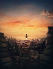 Surrealistic Scene With A Tiny Man Climbing On The Top Of A Huge Books Landfill. Different Thrown Book Piles And A Person Silhouette Against Sunset. Educational Concept, In Search Of Knowledge