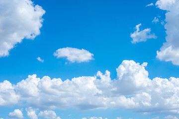 many white clouds in the blue sky