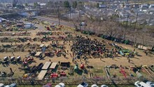 An Aerial View Of An Amish Mud Sale In Pennsylvania Selling Amish Products On A Sunny Day