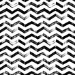 Seamless zig zag vector pattern. Abstract monochrome geometric brush strokes. Black and white hand painted ink illustration. Freehand horizontal zigzag stripes print. Simple classic geometric ornament