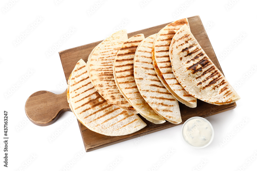 Board with tasty quesadillas and sauce on white background