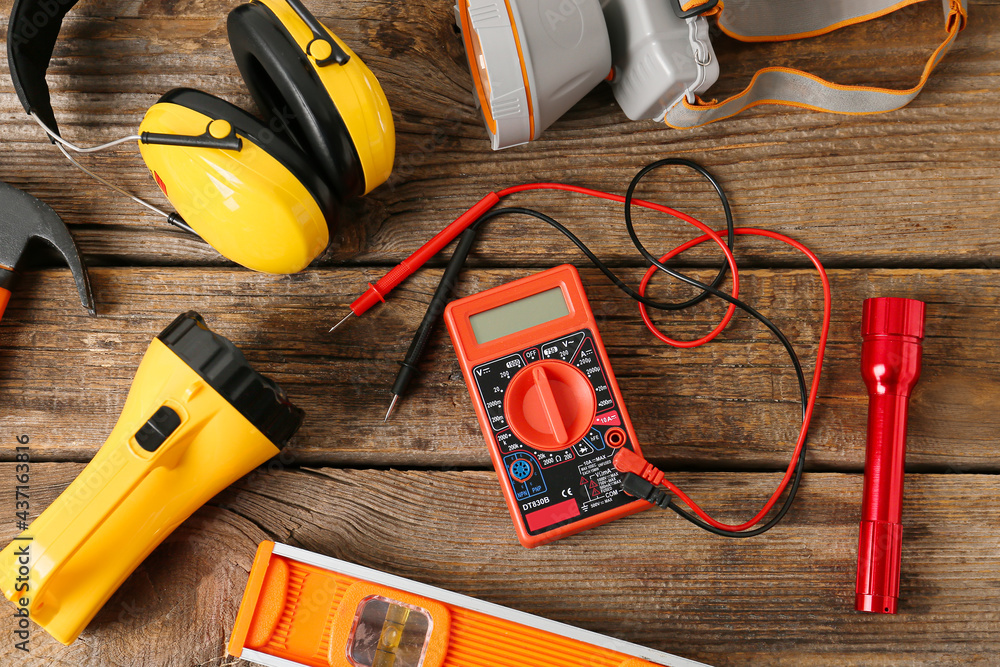 Safety equipment on wooden background
