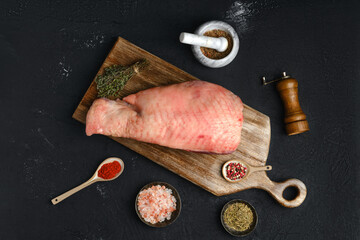 Wall Mural - Top view of raw half of turkey breast with bone and skin