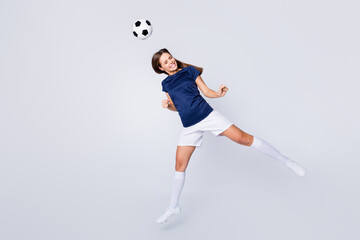 Poster - Full length body size view of her she nice attractive lovely motivated sportive addicted straight-haired girl jumping hitting ball having fun hobby isolated on light white gray pastel color background