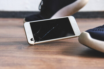 Wall Mural - the mobile phone falls to the floor