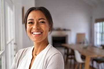 Happy mid woman looking at camera