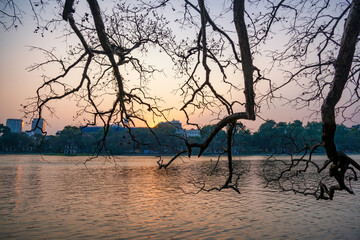 Wall Mural - Turtle Tower, the symbol of Vietnam, at twilight period at Hoan Kiem lake (Ho Guom or Sword lake)