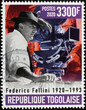 Famous filmaker Federico Fellini at work on postage stamp