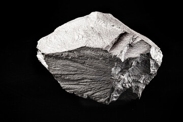 Poster - Iron mineral isolated on black background, concept of mining and stone for industrial use.