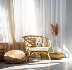 wicker chair in the interior by the window