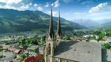 Aerial Flyover Drone Shot Of A Beautiful Town In The Alps Mountains
