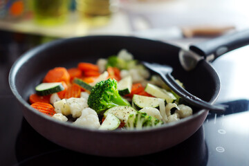 Wall Mural - Fresh vegetables cooking on pan at home