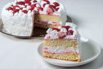 Sticker - Creamy strawberry cake. Homemade cake with whipped cream and fresh strawberries. Cut piece of cake