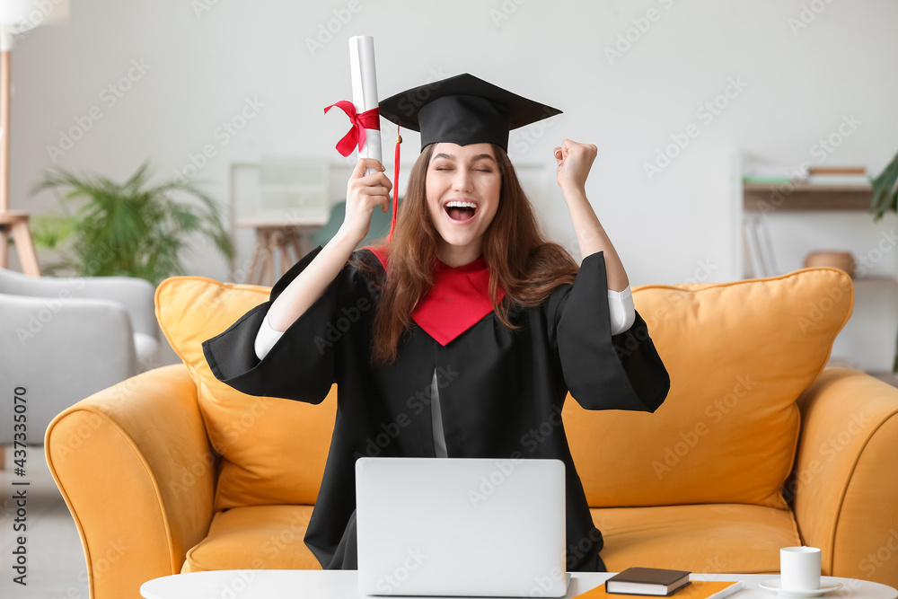 Happy female student on her graduation day at home. Concept of studying online