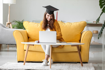 Poster - Happy female student on her graduation day at home. Concept of studying online