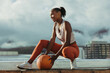 © Jacob Lund - Fitness woman crouching with medicine ball