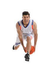 Wall Mural - Professional sportsman playing basketball on white background