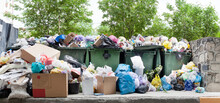Overloaded Dumpster, Full Garbage Container, Household Garbage Bin, Trash Can, Heap Of Unsorted Rubbish: Plastic Bags, Food, Paper, Glass Bottles, Metal Scrap, Pile Of Refuse, Litter, Waste Management