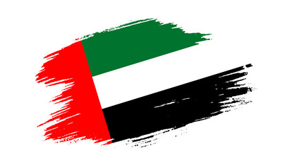 Wall Mural - Patriotic of United Arab Emirates flag in brush stroke effect on white background