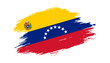 Patriotic of Venezuela flag in brush stroke effect on white background