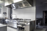 Fototapeta Desenie - Modern stainless industrial kitchen