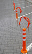 © AVD - Several collapsible orange parking barriers