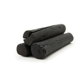 Hardwood charcoal Isolated on white. Kishu binchotan, japanese traditional white charcoal isolated on white background.