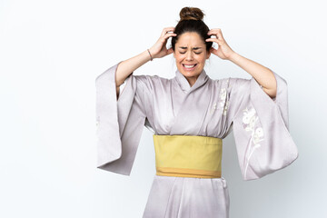 Woman wearing kimono over isolated background doing nervous gesture