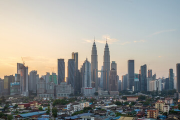 view of kuala lumpur skyline during sunrise