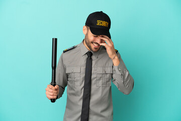 Poster - Young security man isolated on blue background laughing