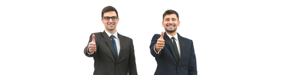 Wall Mural - The two businessmen thumb up on the white wall background